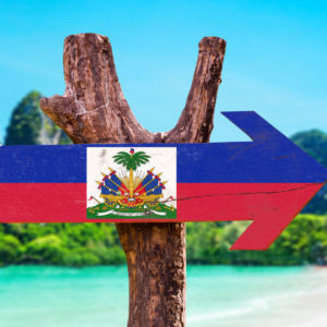 Haiti Flag wooden sign with beach background