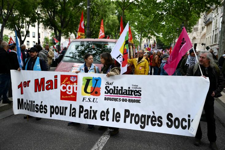 france-–-may-1:-thousands-of-people-march-for-wages
