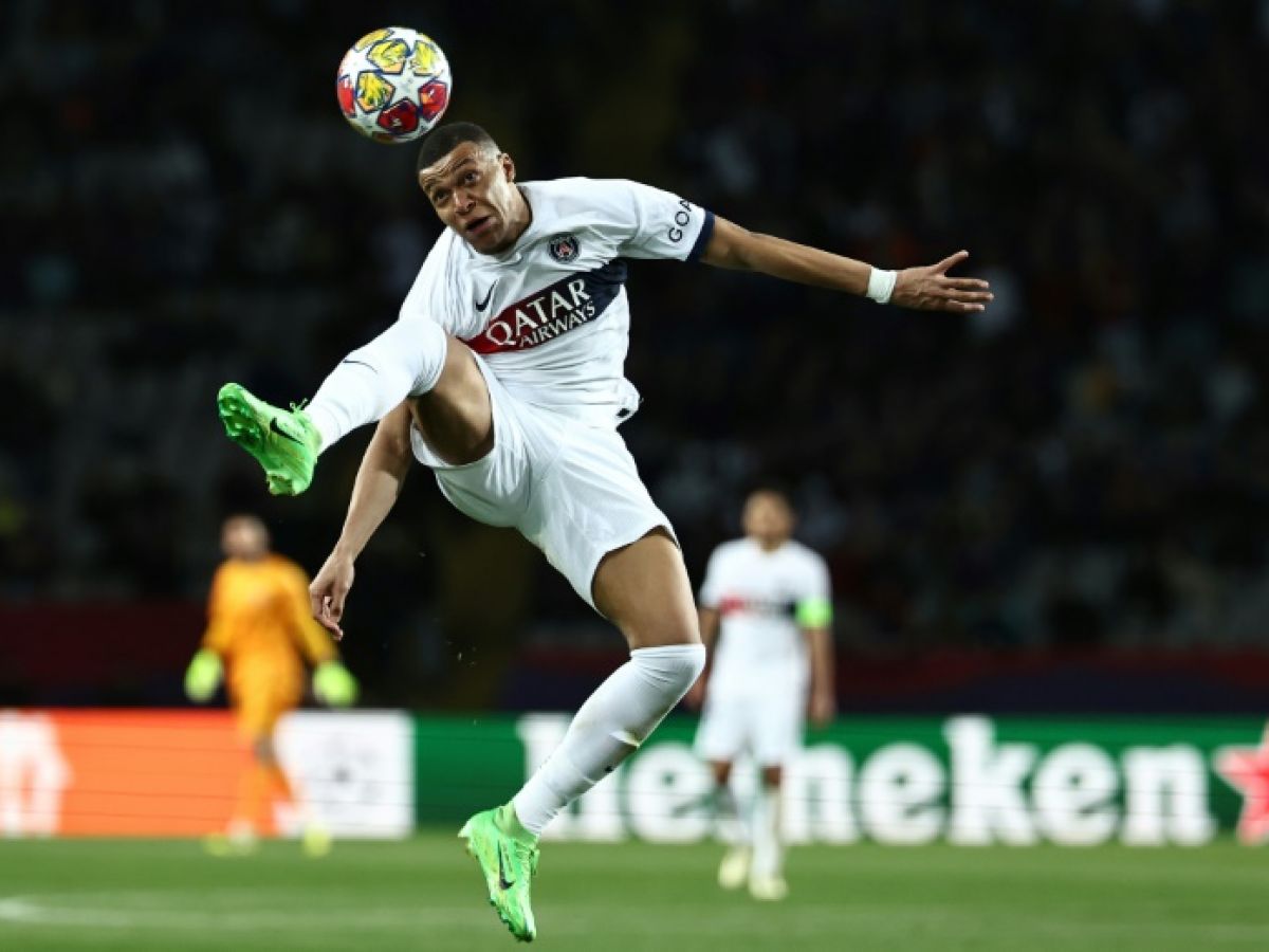 football:-kylian-mbapp-officially-signs-for-real-madrid-for-five-years